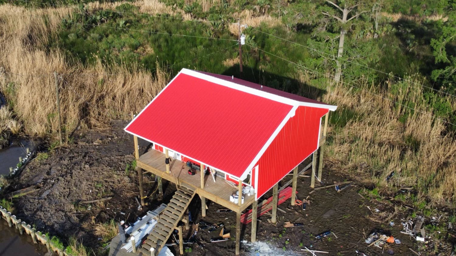 Standing-seam metal roof on a waterfront camp in the Louisiana marsh