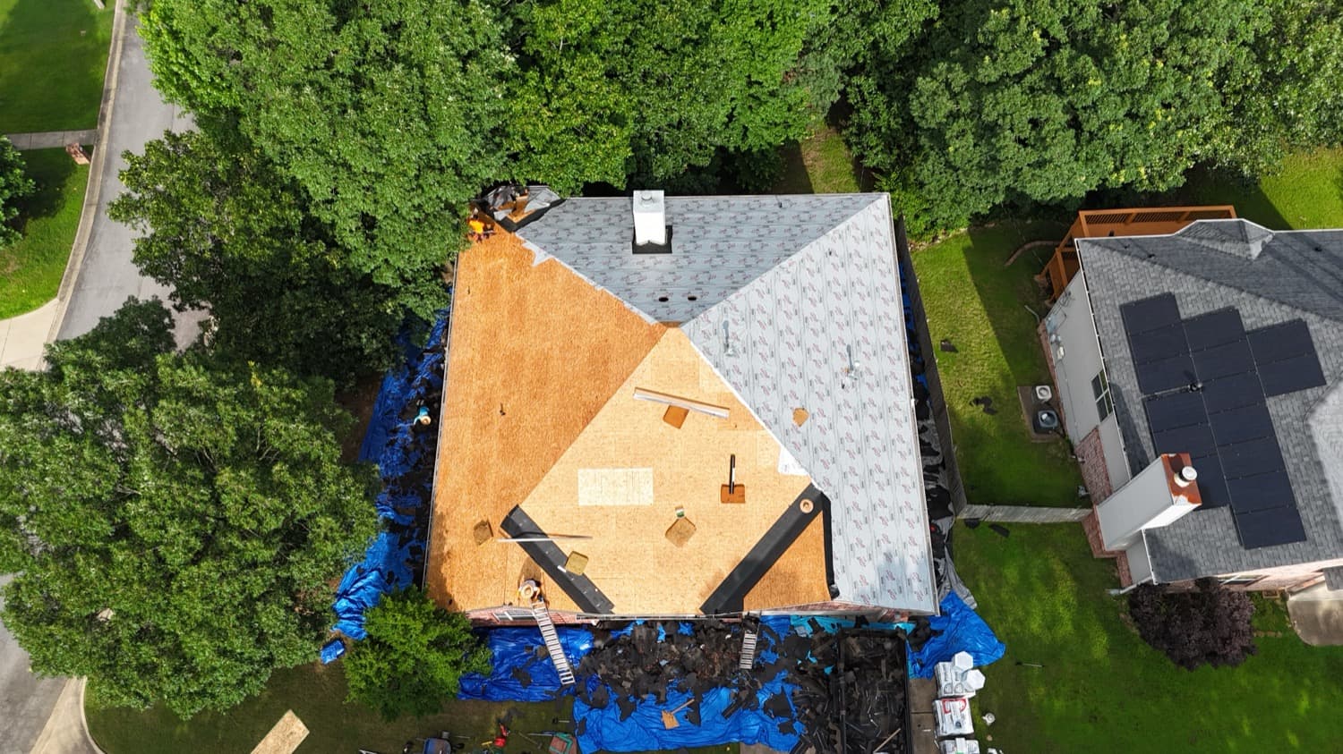 New synthetic underlayment and shingle courses during installation
